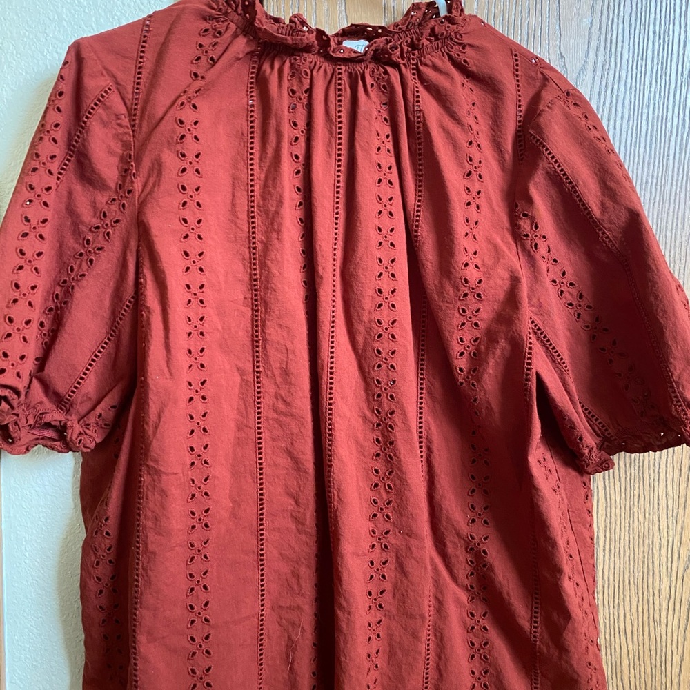 burnt orange blouse